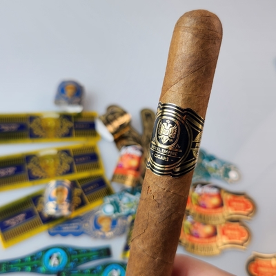 comprare Anello di sigaro stampato in vinile personalizzato di alta qualità con spot UV e foglio d'oro in incisione di stampa di alta qualità online manufacture