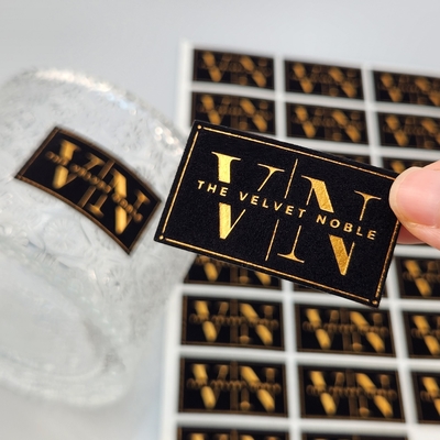 comprare High Quality Customized Embossed UV Gold Foil Printing Card Press Gold Art Paper Velvet Gold Stamping Label Sticker for Perfume & Party  online manufacture