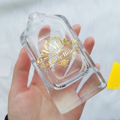Buon prezzo Imballaggio per profumi Logo personalizzato Etichetta per bottiglia di profumi Stampaggio a caldo Adesivi trasparenti per candele in linea