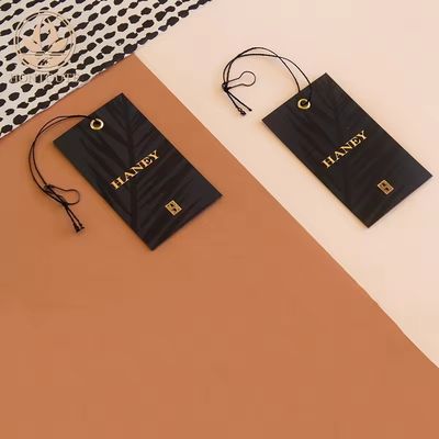 Buon prezzo Colore Custom Kraft Stampa Abbigliamento Etichette impermeabile Logo personalizzato Etichette per abbigliamento in linea