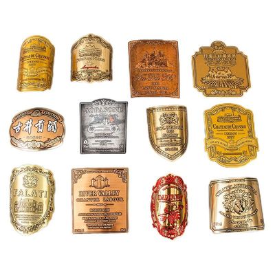 Buon prezzo Adesivo di carta per etichette metalliche in alluminio morbido stampato in oro in rilievo personalizzato per bottiglia di vino in linea